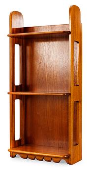 847. A Josef Frank mahogny shelf by Firma Svenskt Tenn.