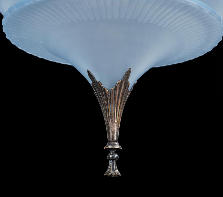 A Simon Gate light blue glass and silver plate chandelier by Orrefors, ca 1925.