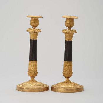 A pair of French Empire 19th century candlesticks.