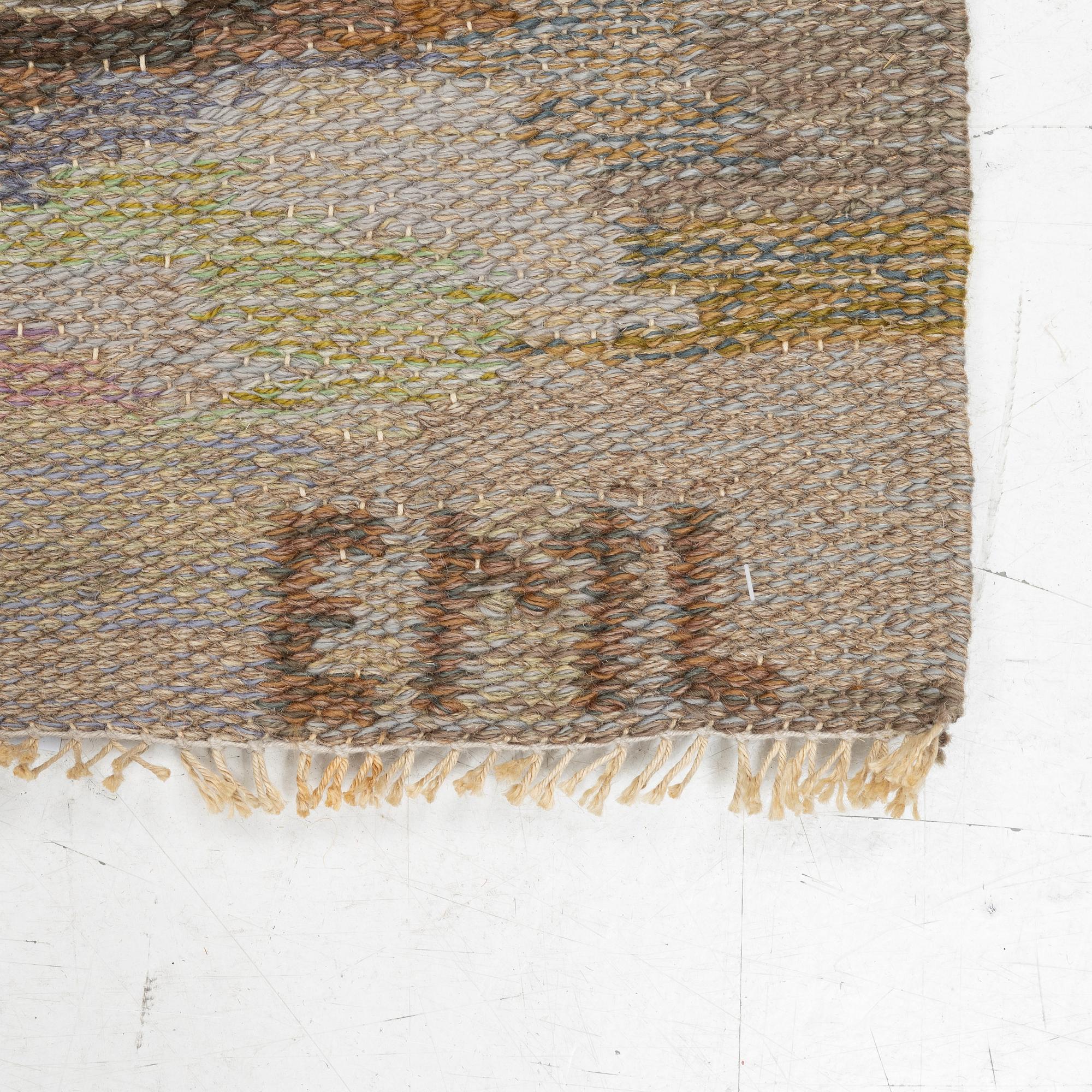 Edvin & Magnhild Lundsten, a carpet, 'Hällristningar' ('Petroglyph'), flat weave, c. 280 x 192 signed EML.