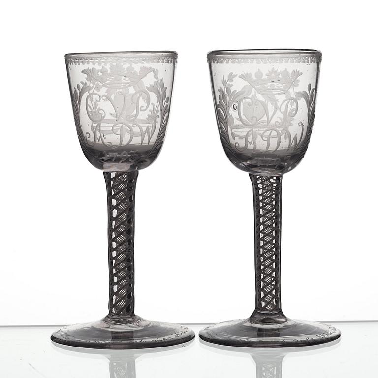 A pair of engraved ale glasses, 18th Century, presumably England.