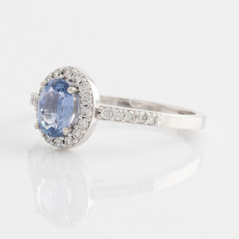 Ring with oval sapphire and brilliant-cut diamonds.
