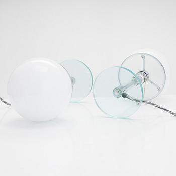 Wilhelm Wagenfeld, a pair of Bauhaus style 'WG24' table lights, Egoluce, Italy, 2000s.