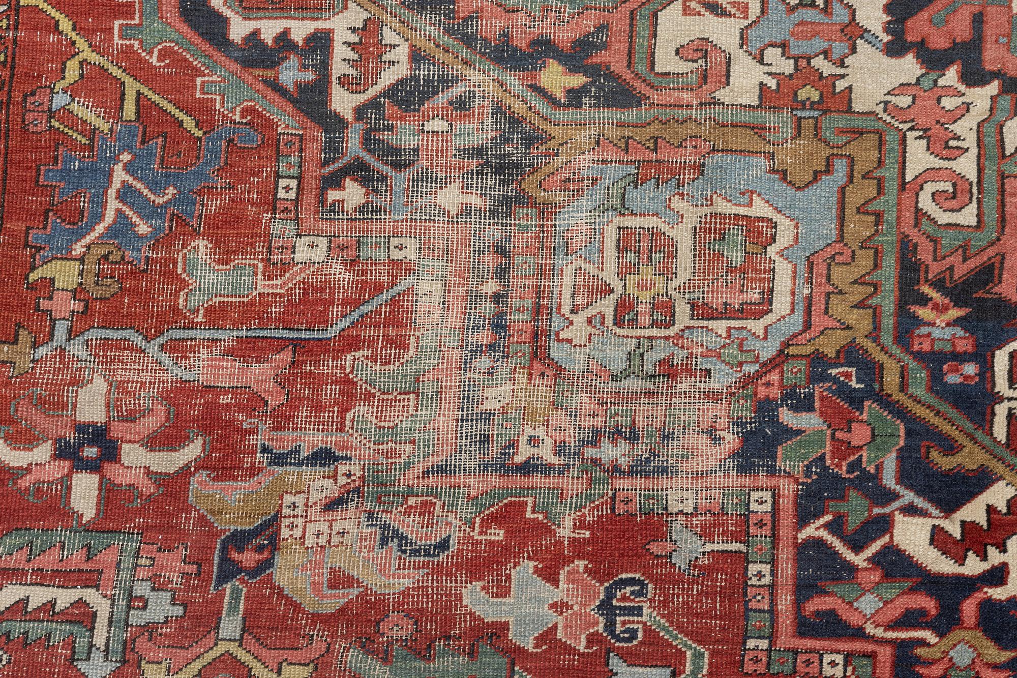 An Antique Heriz carpet, north west persia, c. 420 x 210 cm.