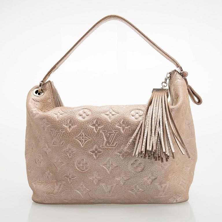 Louis Vuitton, a shimmer 'Halo' bag.