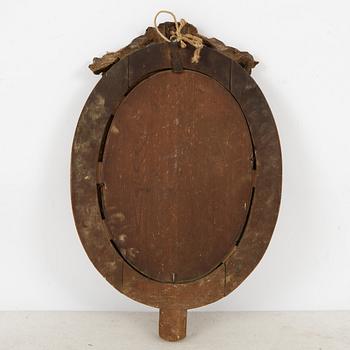 A Gustavian giltwood two-branch girandole mirror, late 18th century.
