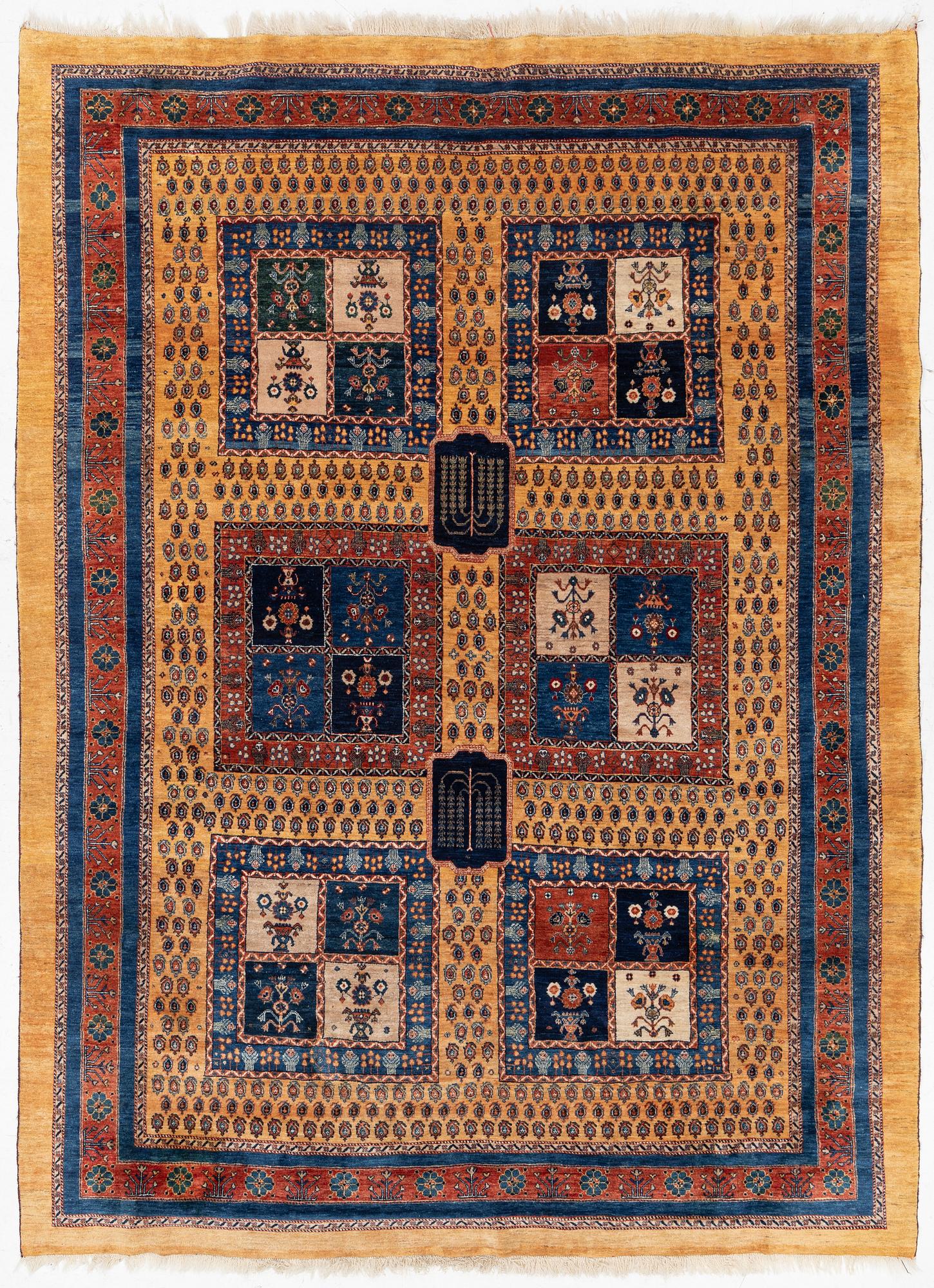 An oriental 'garden' carpet of Safavid design probably from the Shiraz area, Iran, c 343 x 254 cm.