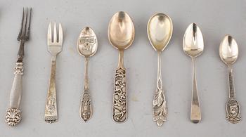 A collection of silver of 57 pcs, i.a souvenir spoons, 20th century. Total weight 1073 g.