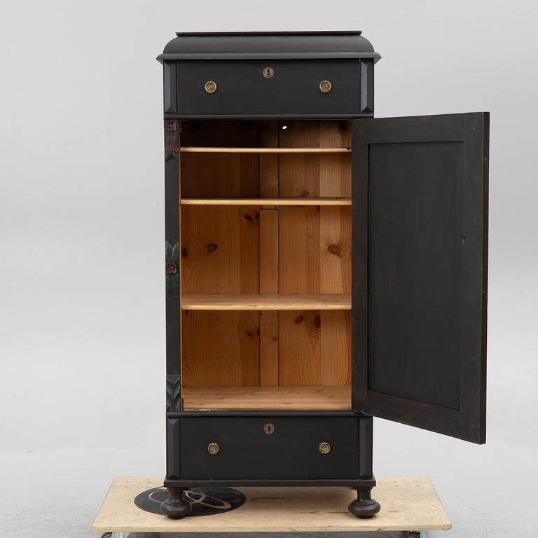 A cabinet, circa 1900.