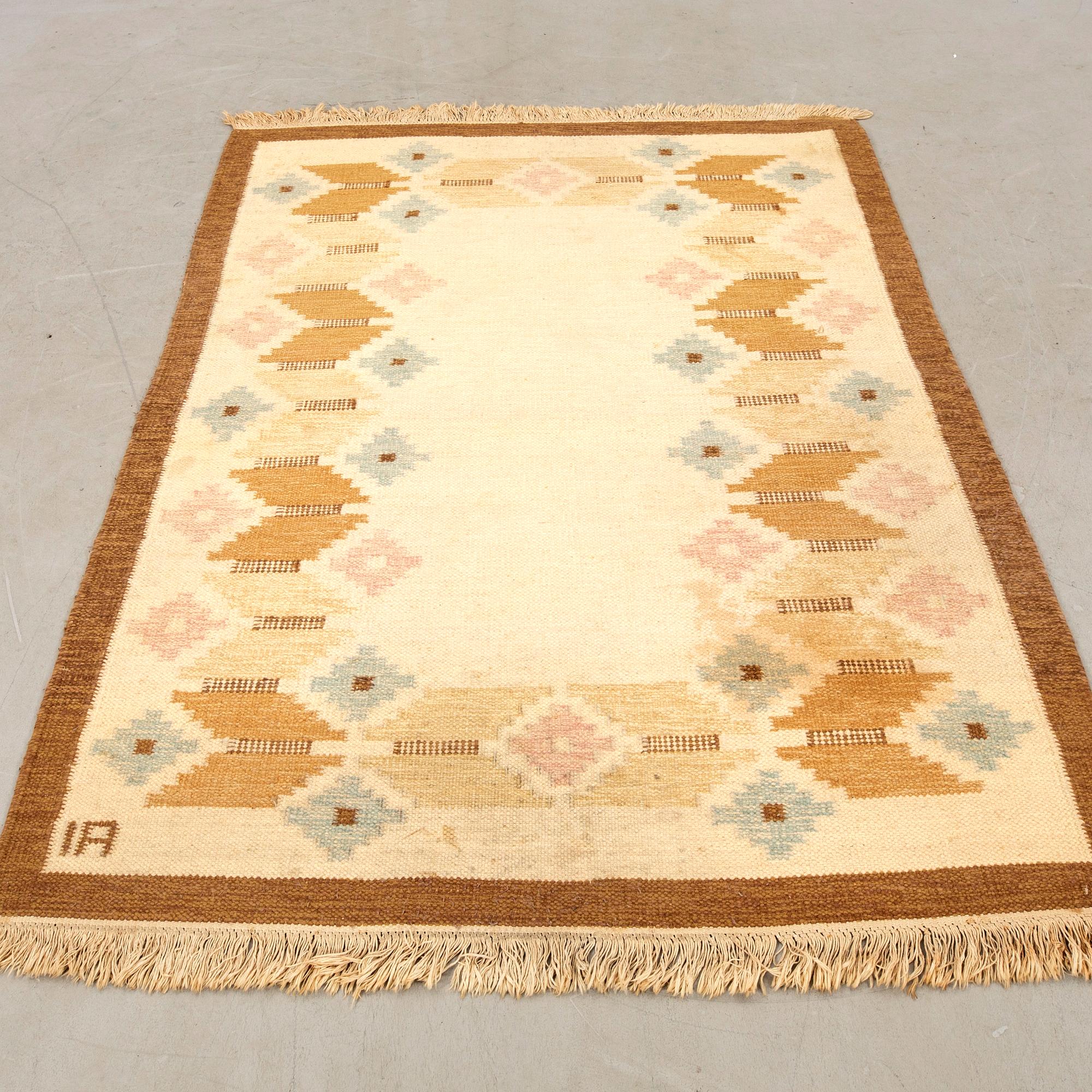 Röllakan rug, approximately 188x143 cm, signed "IA".