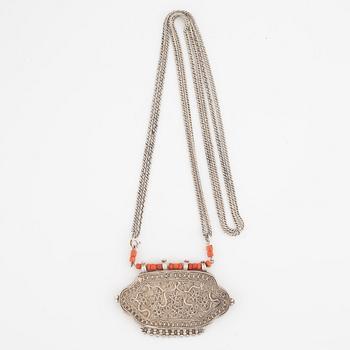 Silver and coral necklace.