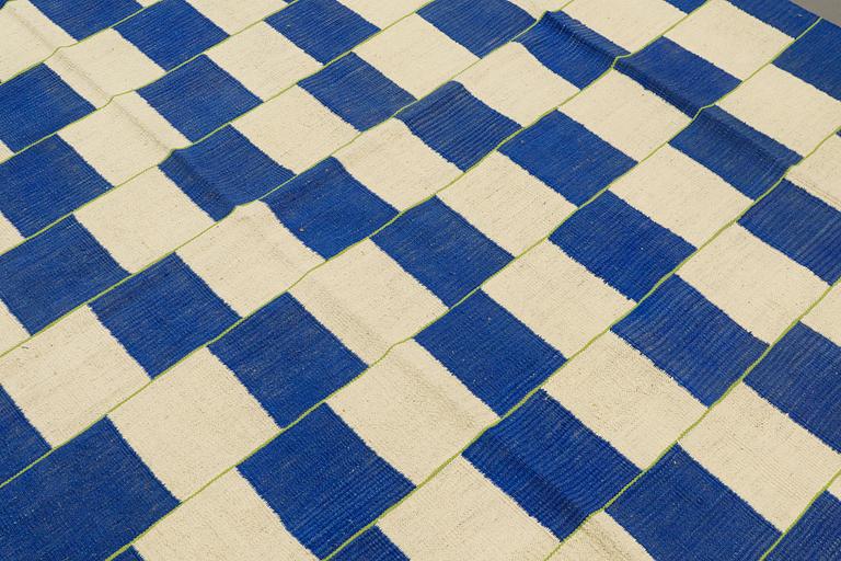 A carpet, flat weave, ca 225 x 182 cm.
