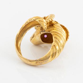 An 18K gold ram´s head ring set with round brilliant-cut diamonds and rubies.