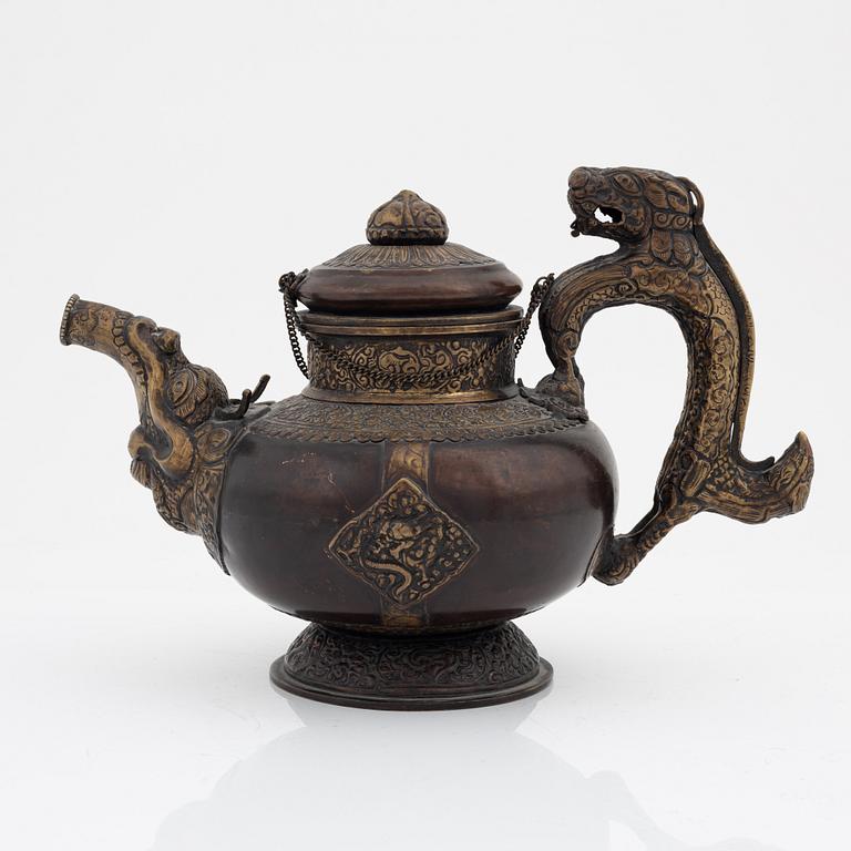 A Tibetan brass/copper teapot, circa 1900.
