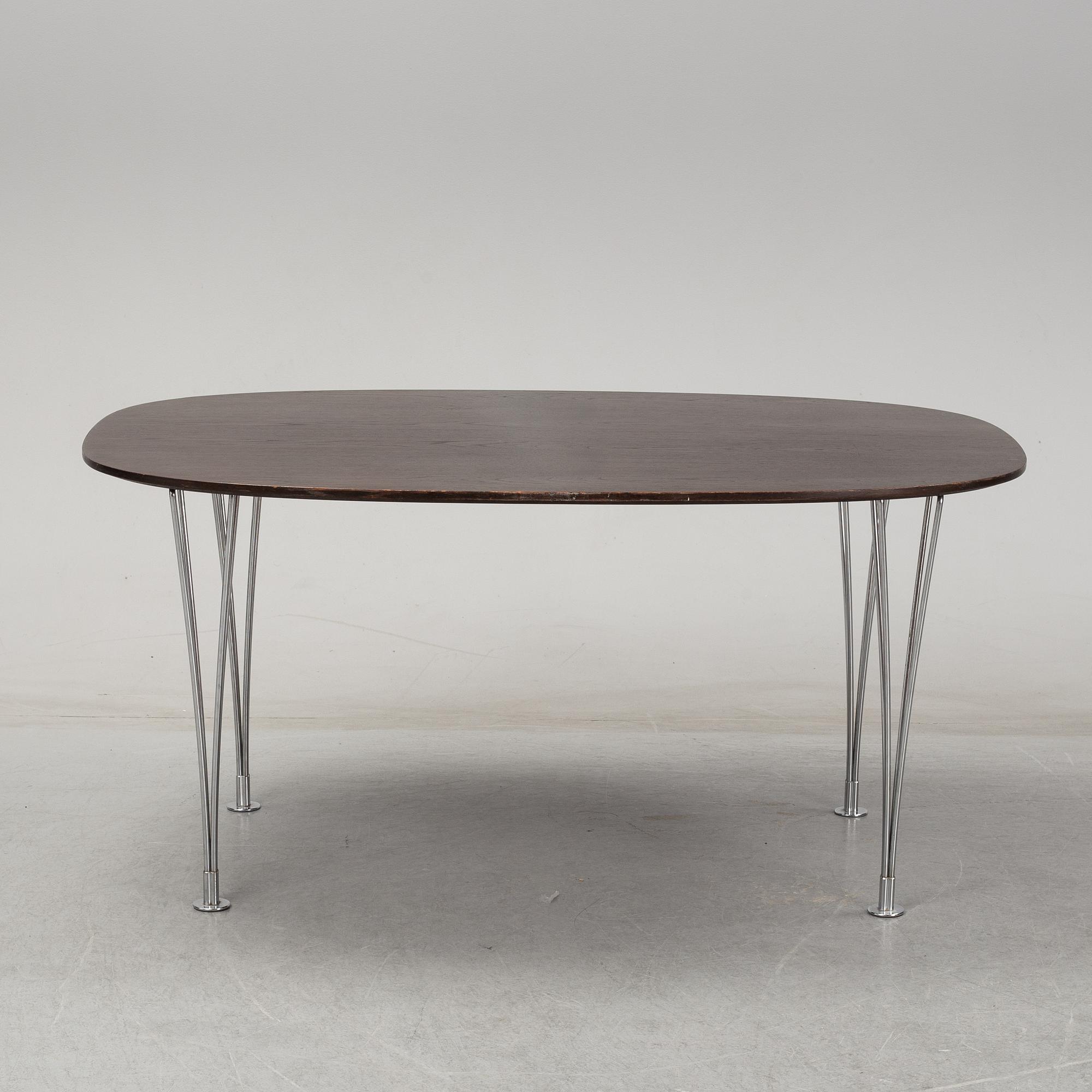 A 'Super-elliptical table by Piet Hein & Bruno Mathsson for Fritz Hansen.