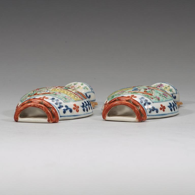 A pair of famille rose wall vases, late Qing dynasty, circa 1900.