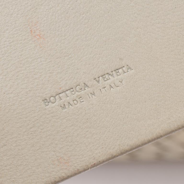 A bag by Bottega Veneta.