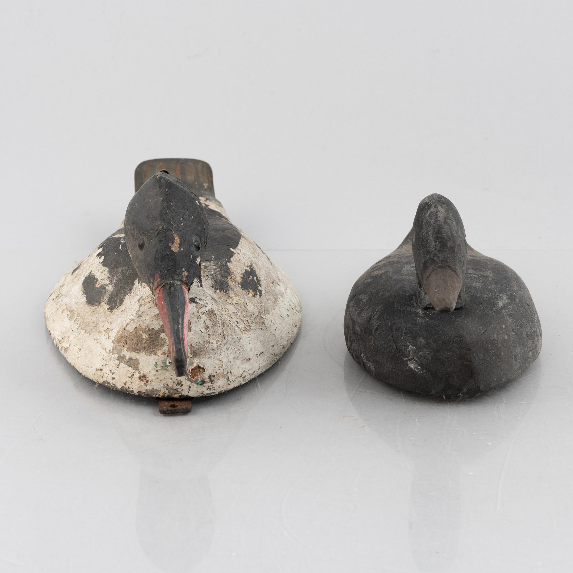 A set of six wooden duck decoys, 20th century.