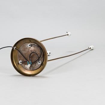 A mid-20th-century three-light floor lamp.