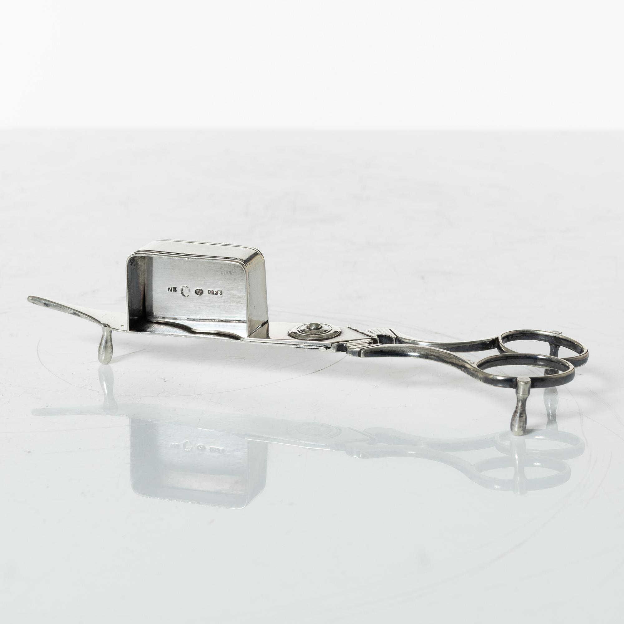 A Swedish Empire silver candle snuffer and tray, Stockholm 1818-1819.