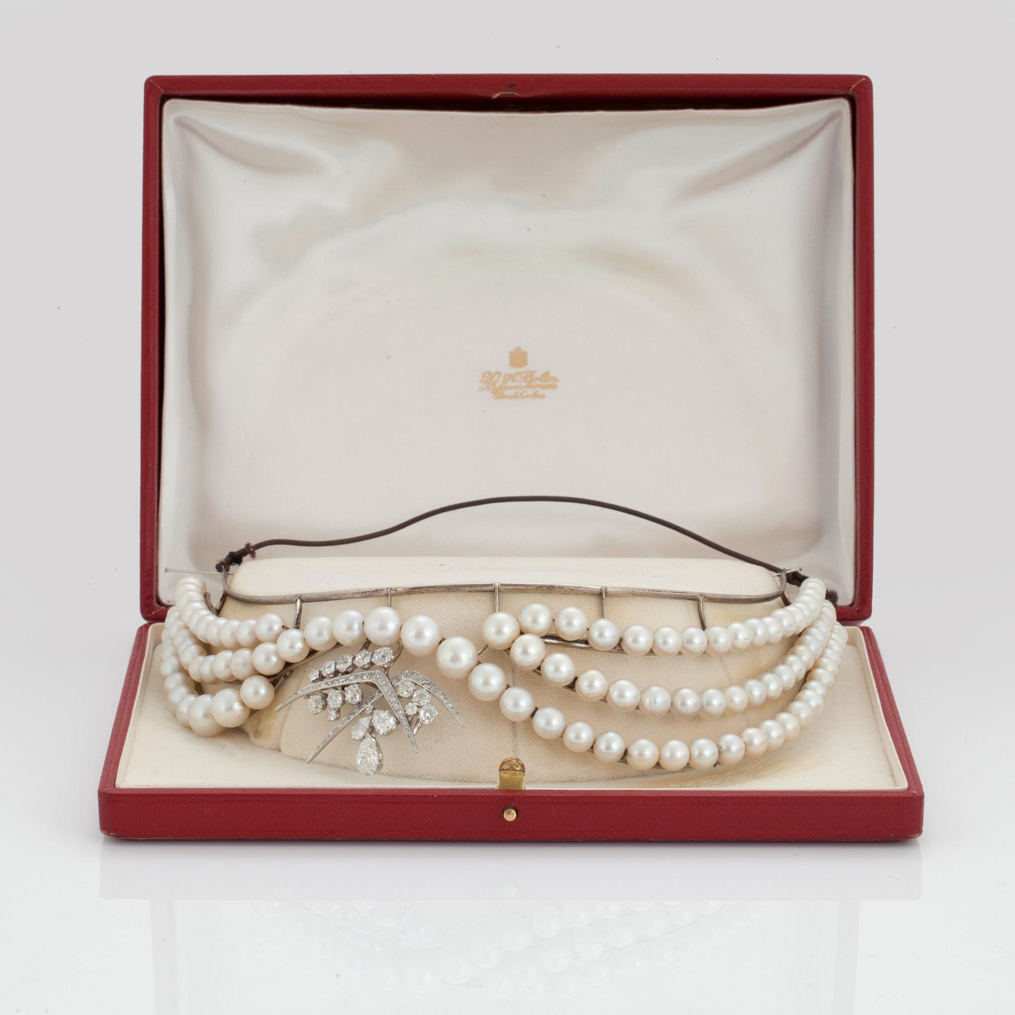 A TIARA with cultured pearls and a detachable brooch set with old-cut diamonds.