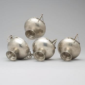 A set of four pewter stem cups by G F Baumann, master 1789.