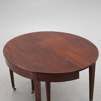 A 19th Century English Dining Table.