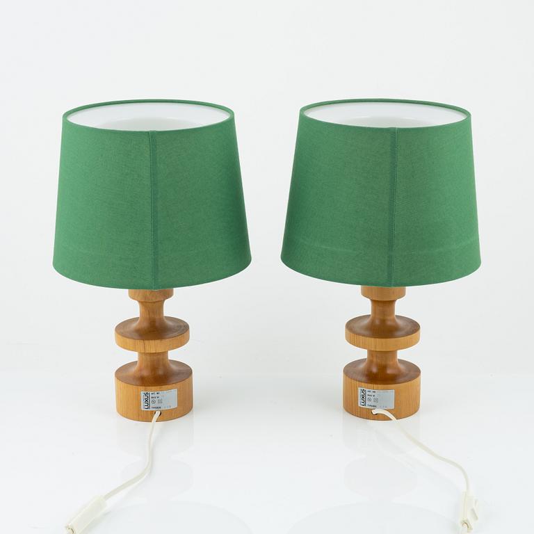 Uno & Östen Kristiansson, a pair of pine 'Flens' table lights, Luxus, Vittsjö.