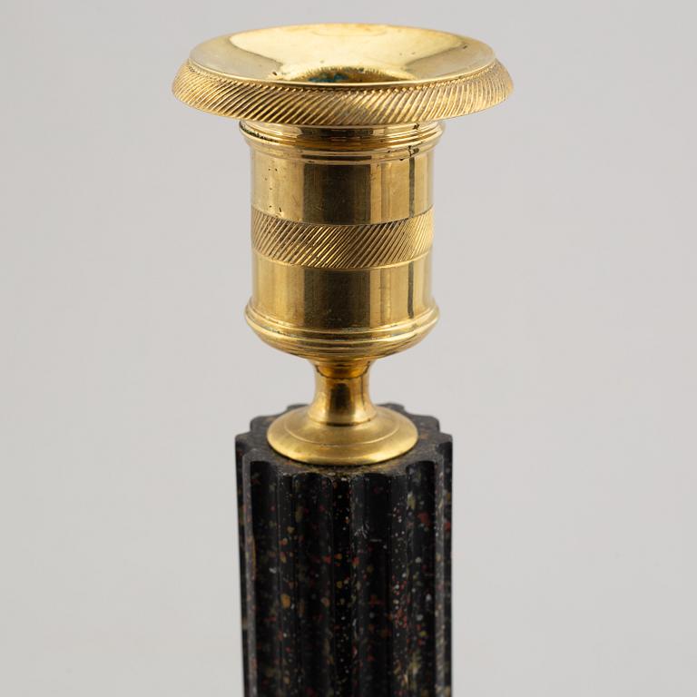 A pair of porphyry imitation candlesticks, 20th century.