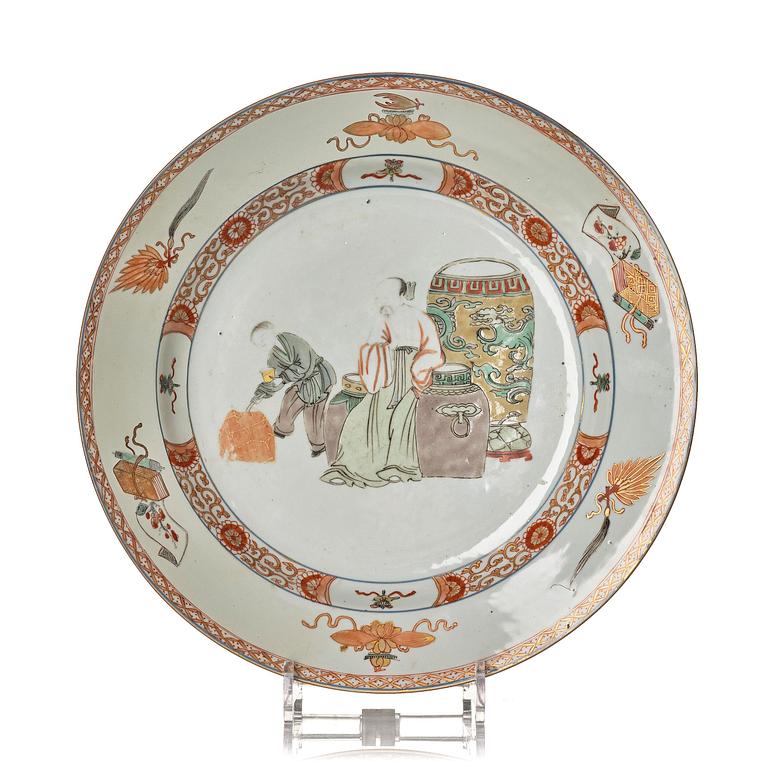 A large iron red and famille verte charger, Qing dynasty, early 18th century.