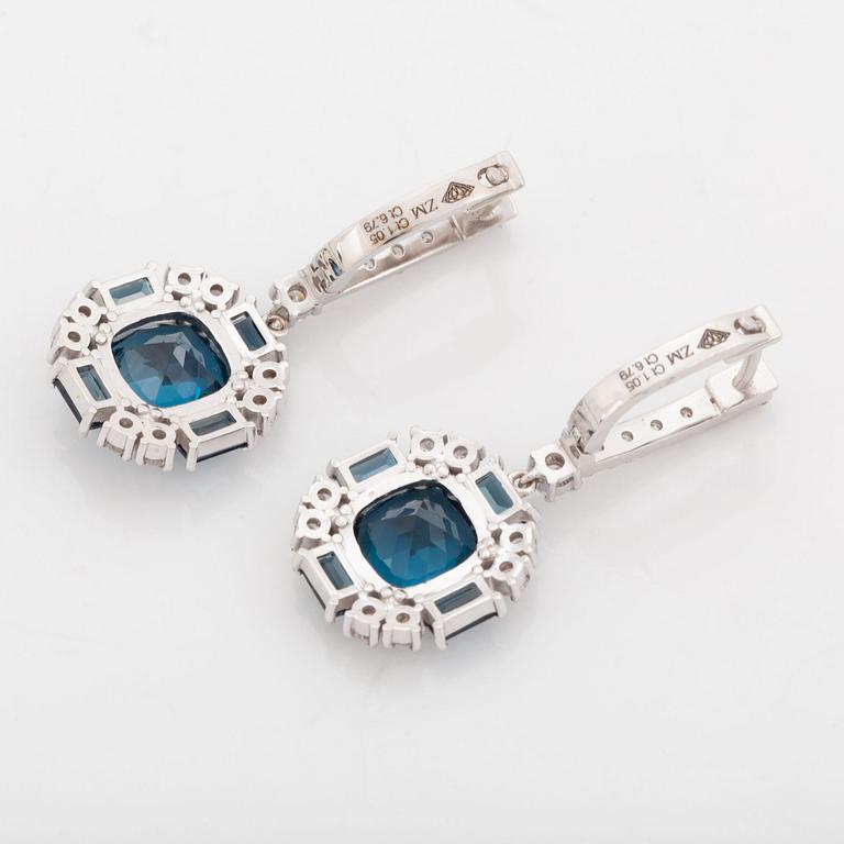 Topaz and brilliant cut diamond earrings.