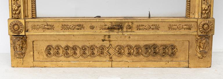 Empire, A late Empire mirror, first half of the 19th century.