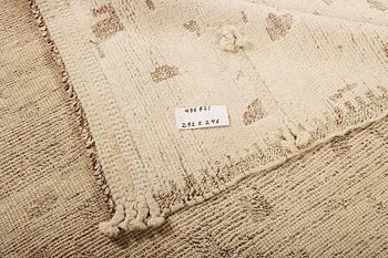 A Moroccan carpet, a. 292 x 246 cm.