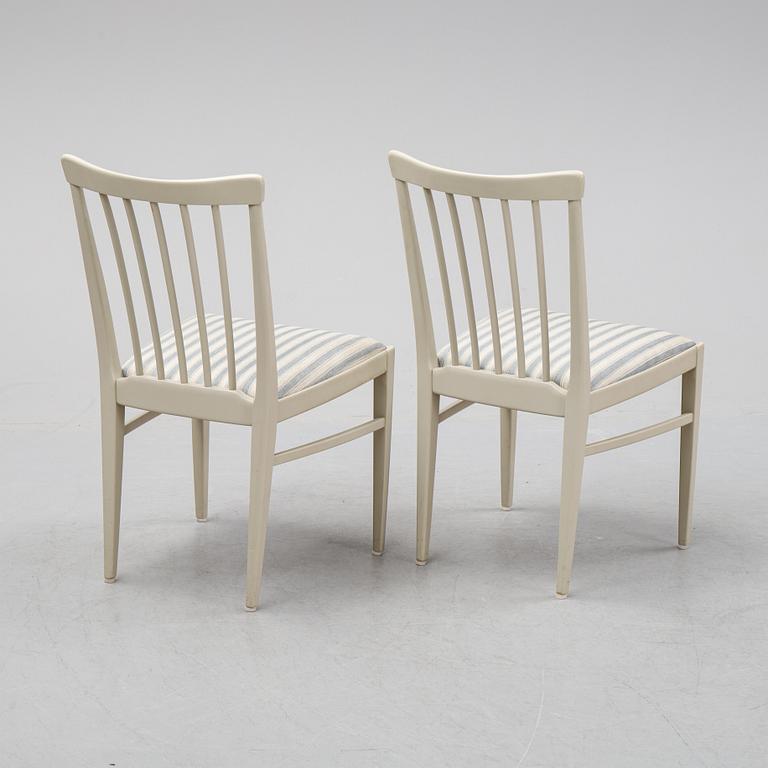 A dining table and six chairs by Carl Malmsten for Bodafors.