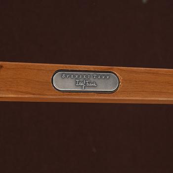 Josef Frank, a model B 2082 bench, Svenskt Tenn.