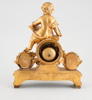 A Louis XVI style table clock, around the year 1900.