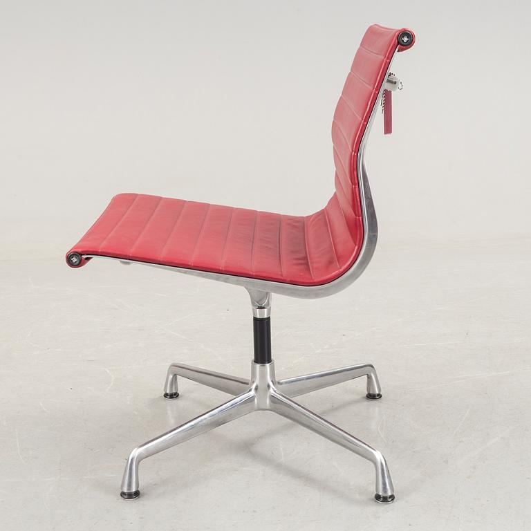 An Aliminium Group chair, model EA105 by Chales and Ray Eamed, produced by Vitra.