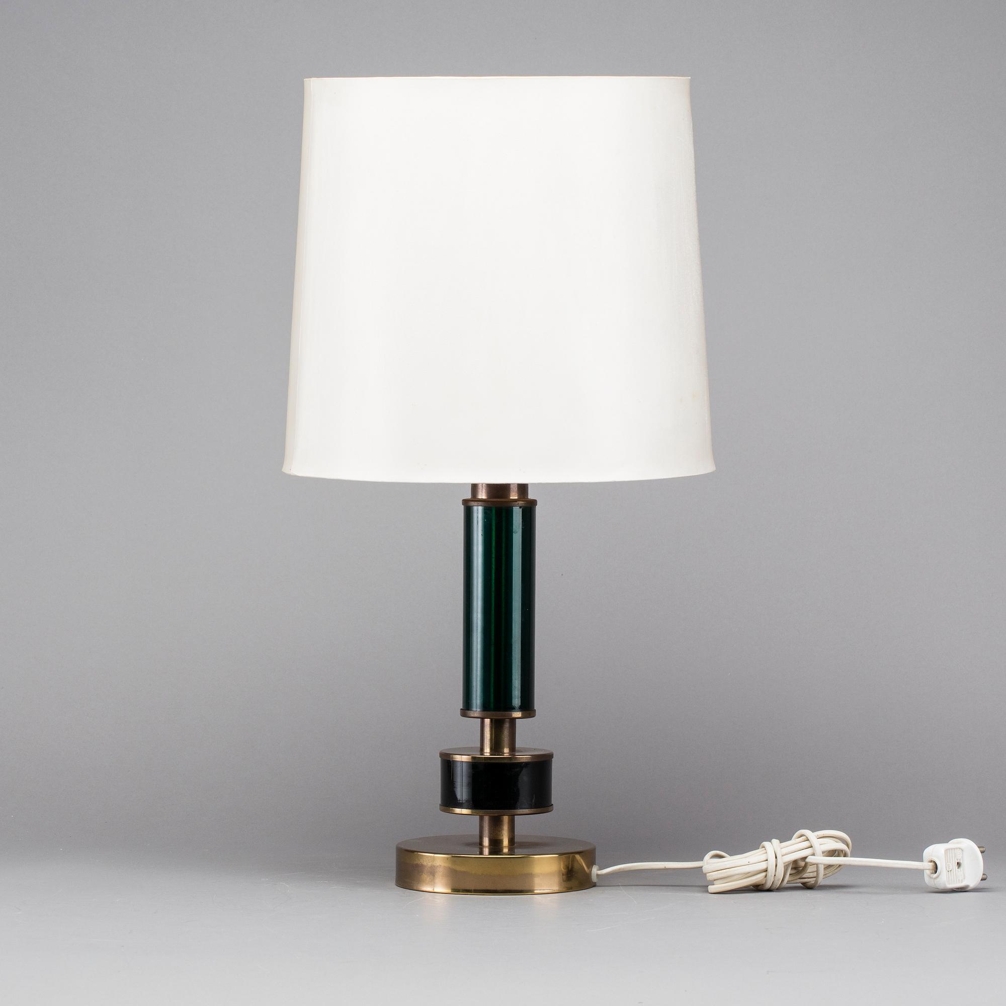 A BRASS AND GLASS TABLE LAMP, second half of the 20th century.