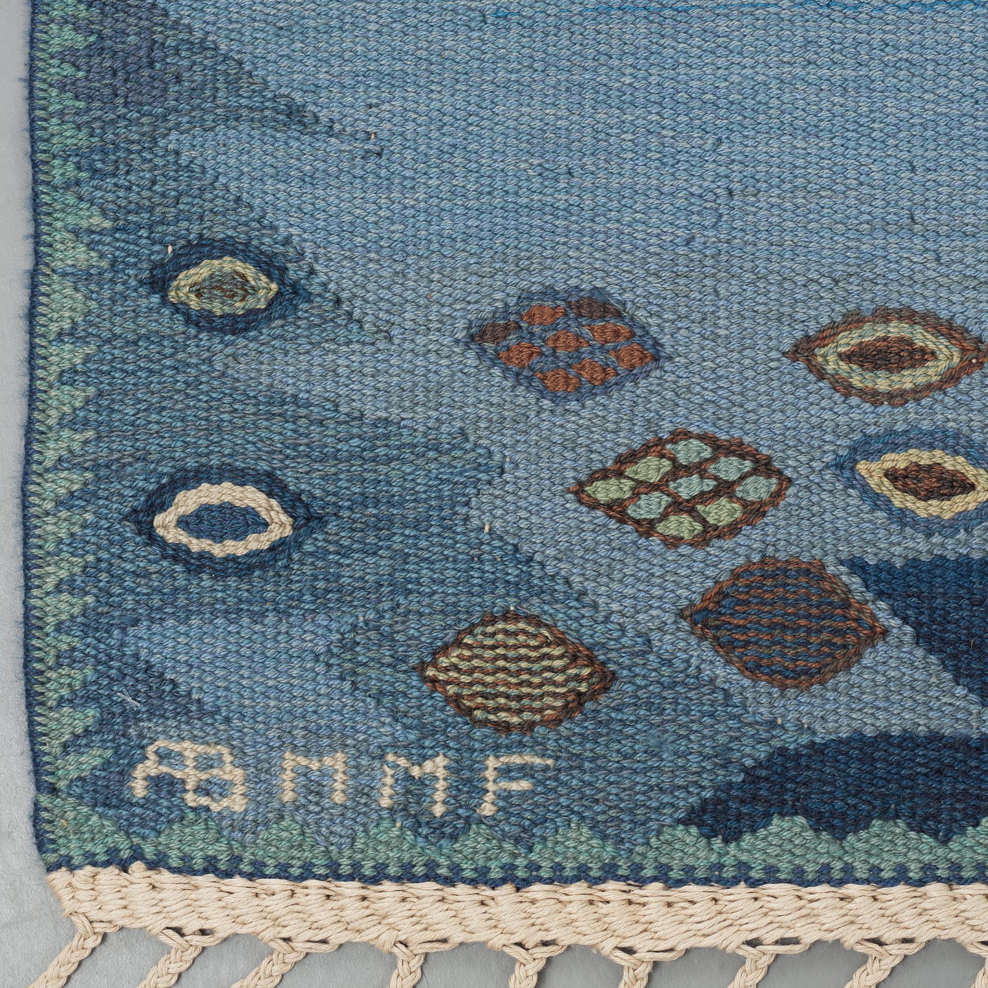 Barbro Nilsson, A carpet, "Tånga blå", flat weave, ca 355 x 252-256 cm, signed AB MMF BN.