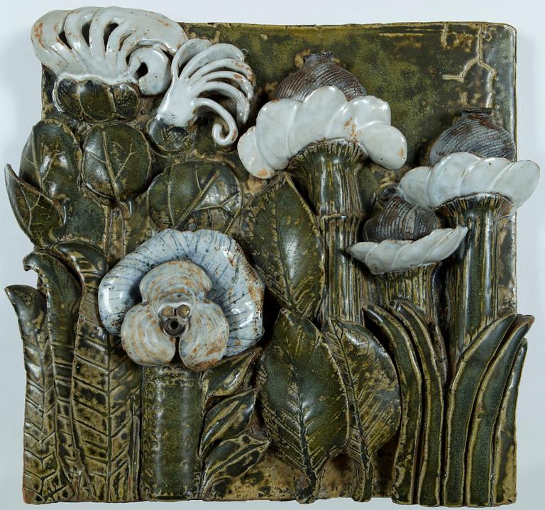 Lisa Larson, an earthenware flower relief, signed Lisa L Sweden, Gustavsbergs Studio hand mark.