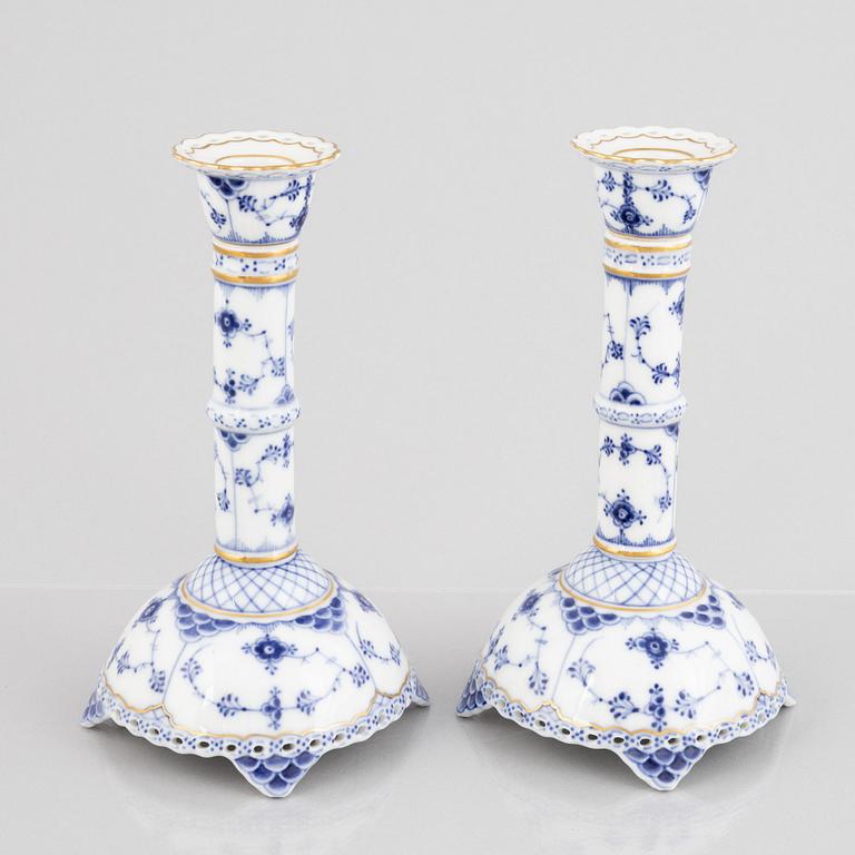 A pair of 'Blue Fluted Full Lace' porcelain Candle sticks, Royal Copenhagen, model number 1008, post 1923.