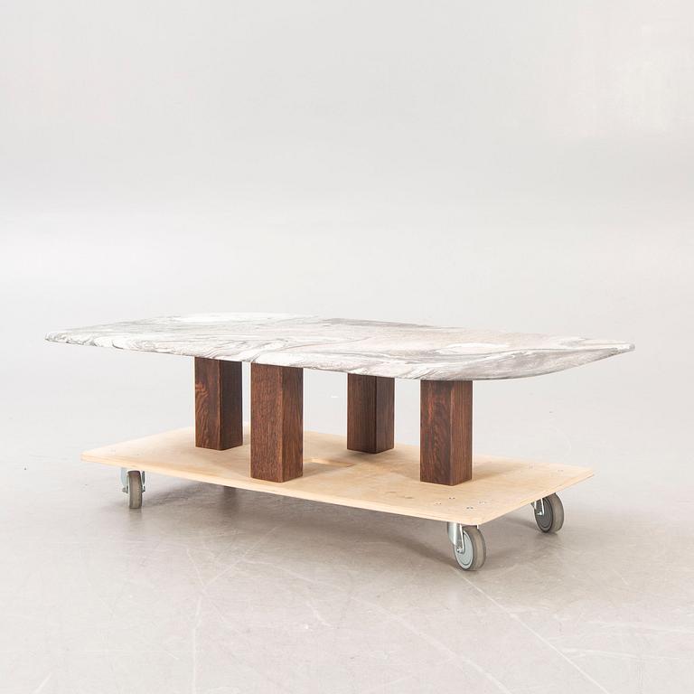 A 1970/80s stone coffee table.