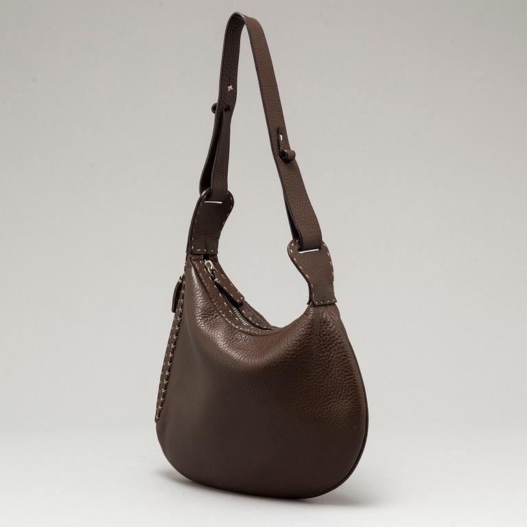 FENDI, a brown leather bag.