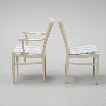 A dining table with two armchairs and six chairs by Carl Malmsten for Bodafors.