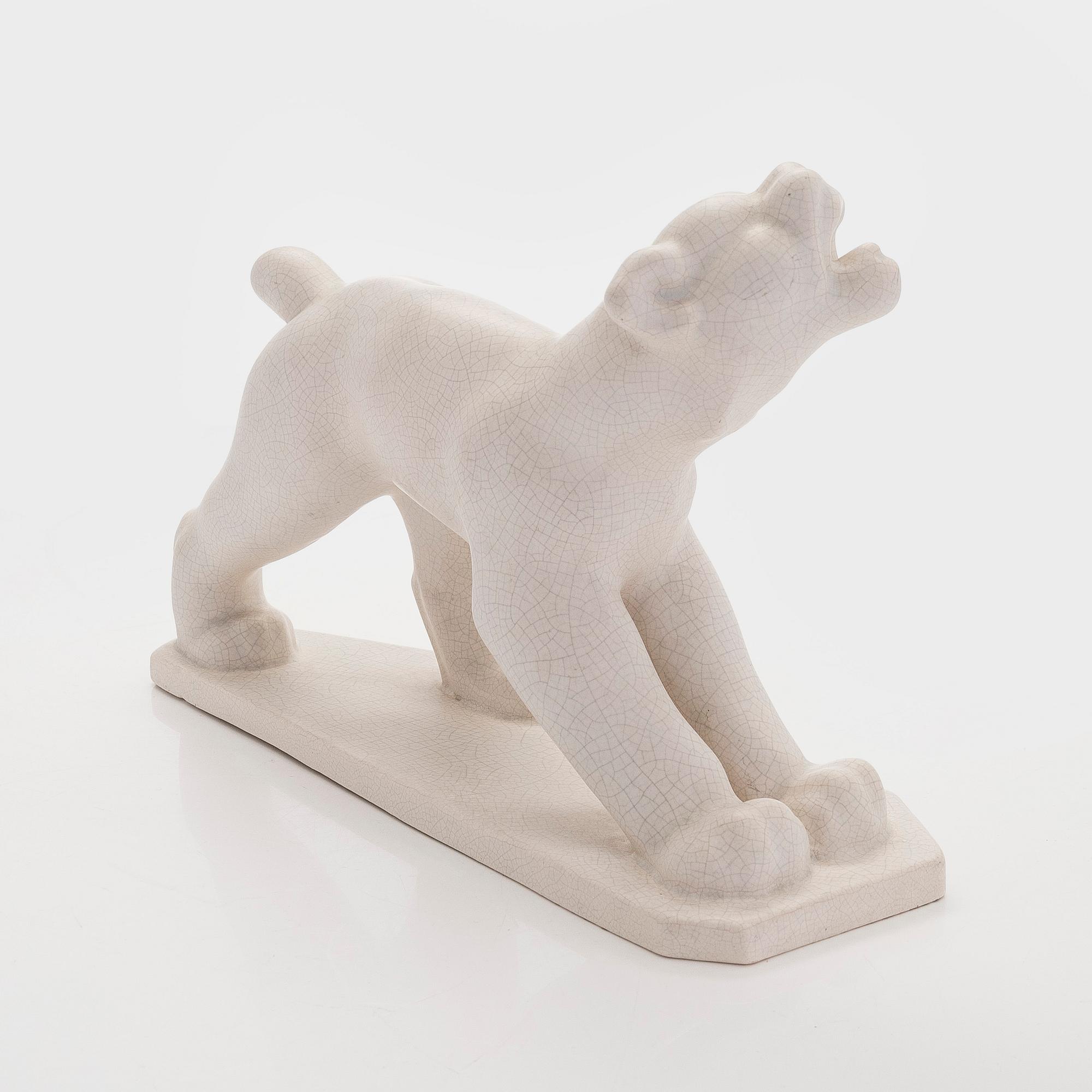 Josef Manuel, A ceramic sculpture, signed.