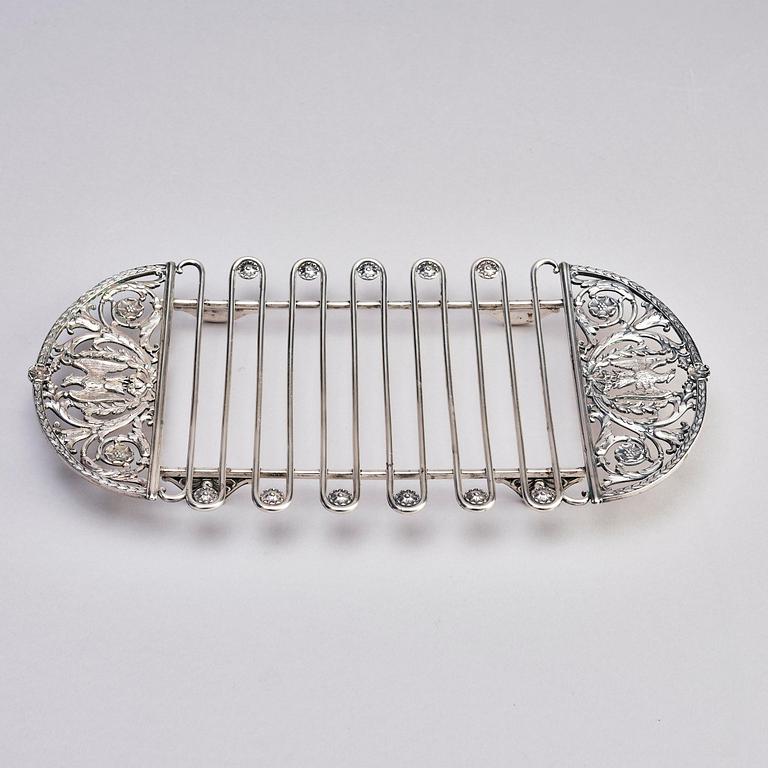 A silver asparagus cradle by W.A. Bolin, Moscow 1912-17.