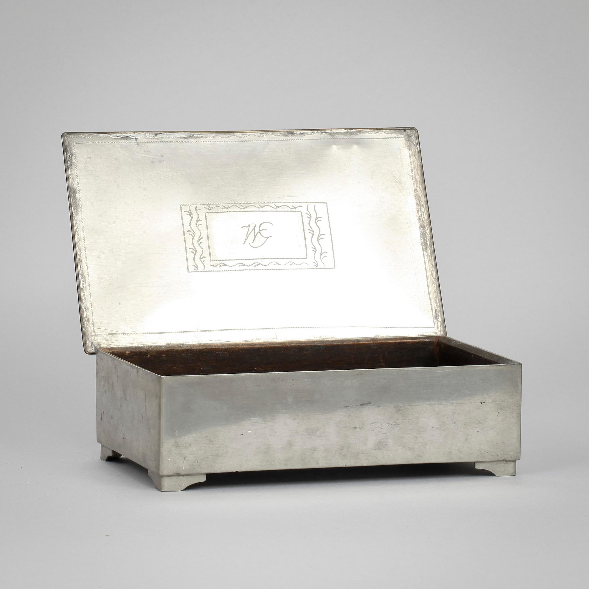 ASK MED LOCK, tenn, 1900-talets början.