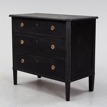 A painted chest of drawers, early 20th Century.