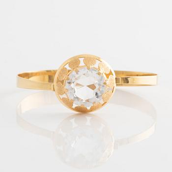 Bangle and ring, 18K gold with rock crystal.