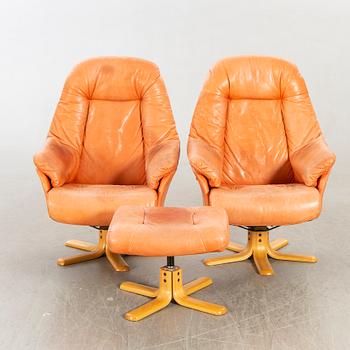 Skalma Denmark, two armchairs with footstool, leather, 20th century later part.